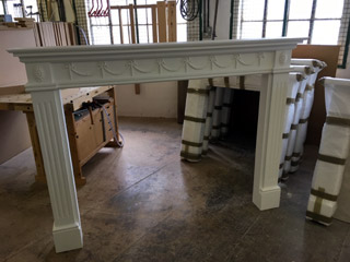 Large white fire surround